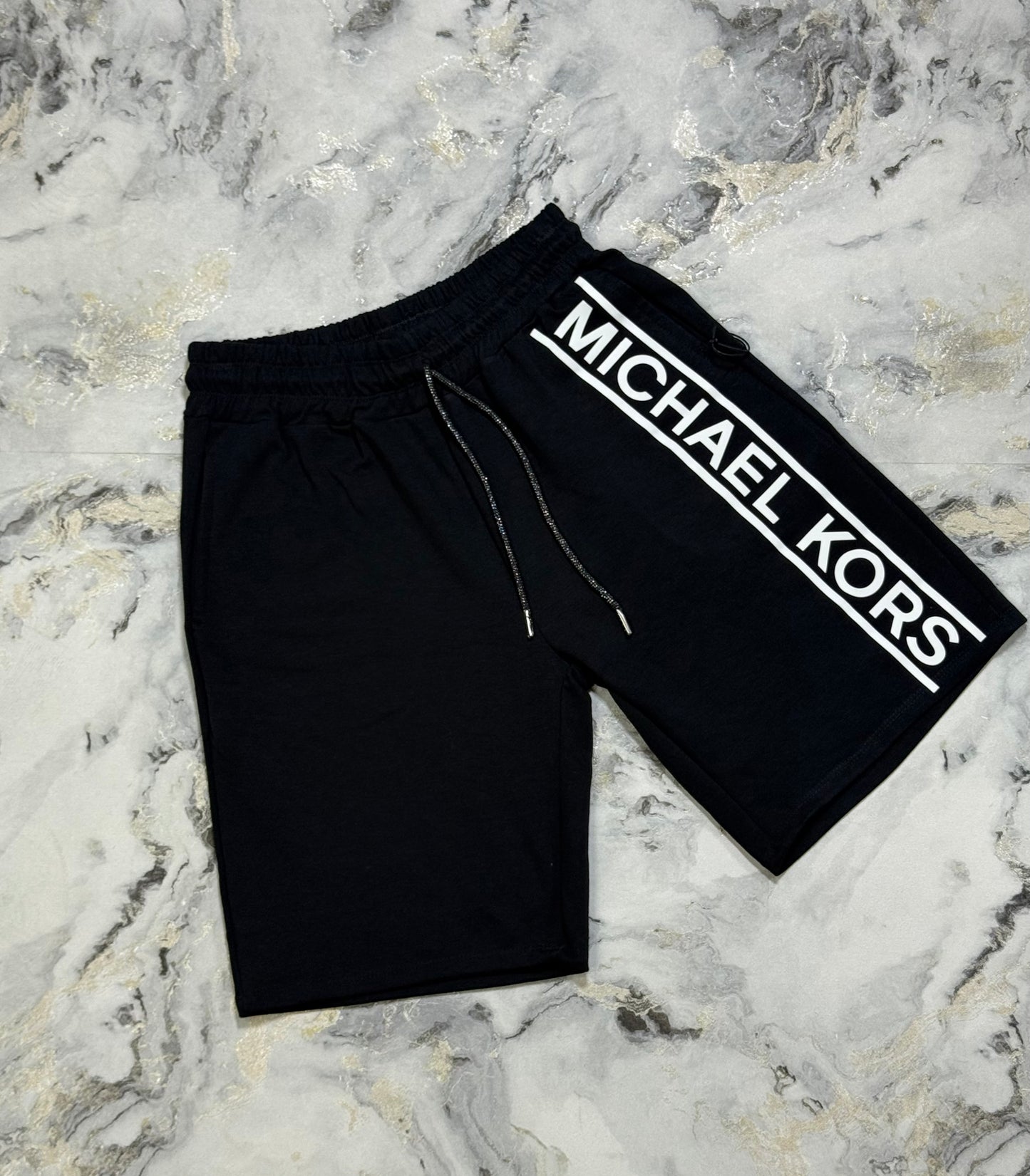 PANTALÓNETA MICHAEL KORS LADO IZQUIERDO