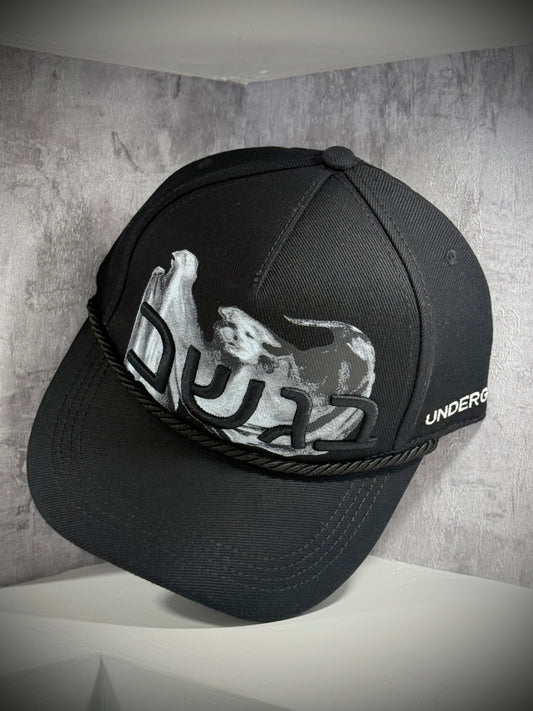 GORRA UNDERGOLD NEGRA TIRA