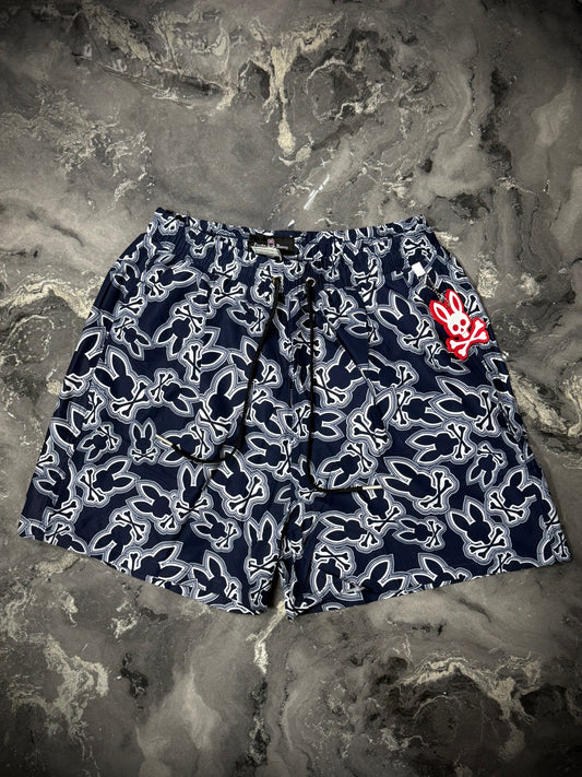 PANTALÓNETA PLAYERA PYSCHO BUNNY LOGO AZUL BLANCO