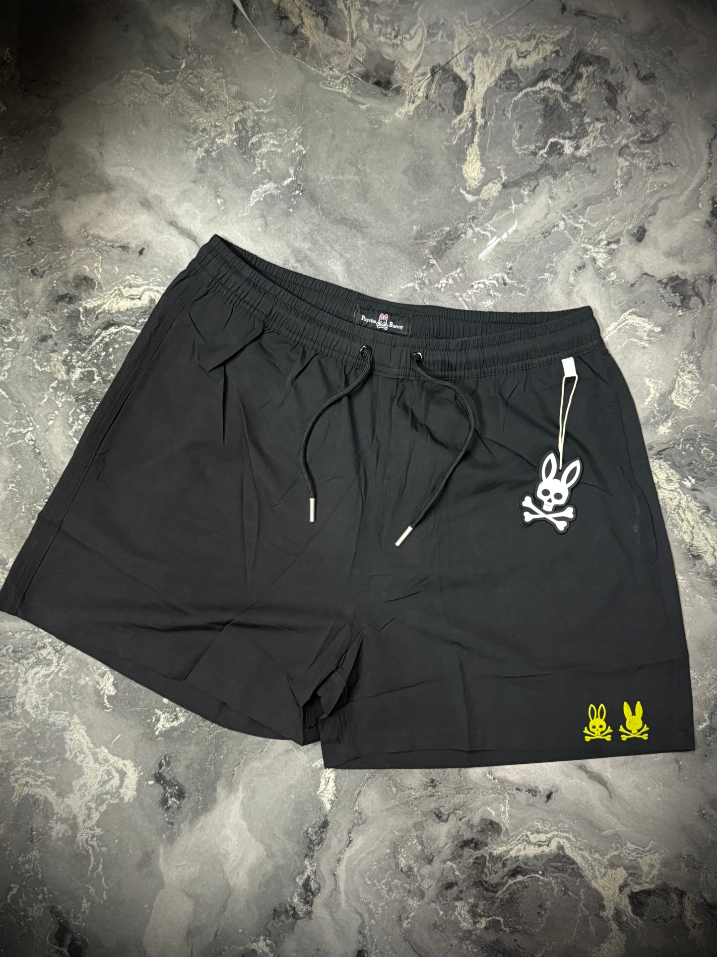 PANTALÓNETA PLAYERA PYSCHO BUNNY LOGO AMARILLO
