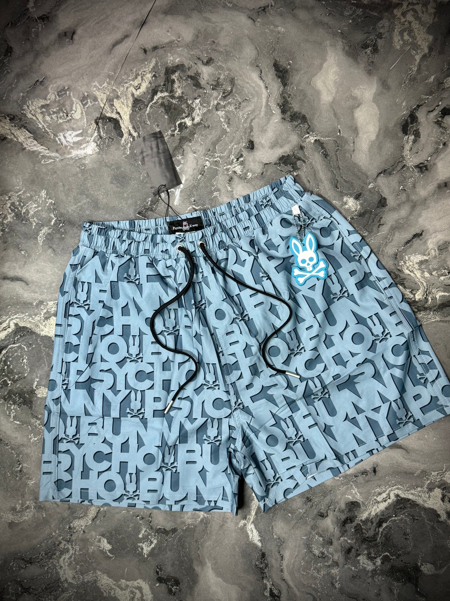PANTALÓNETA PLAYERA PYSCHO BUNNY AZUL MONOGRAMA