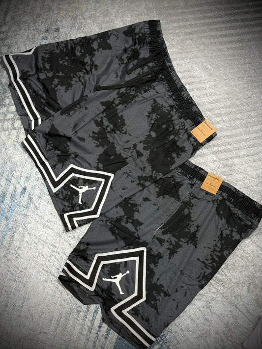 PANTALÓNETA PUNTA DIAMANTE GRIS MANCHAS NEGRAS