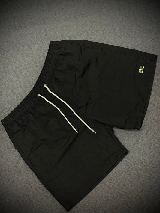 PANTALÓNETA PLAYERA LACOSTE NEGRA LOGO